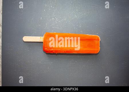 La crème glacée à l'orange fond Banque D'Images