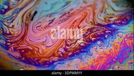 Savon irisé défocalisé irisé cercle de taches d'encre coloré Banque D'Images