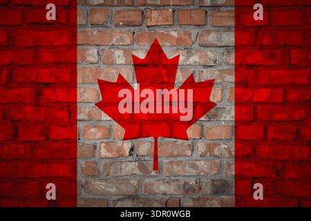 Drapeau du Canada avec feuille d'érable sur mur de briques comme fond Banque D'Images