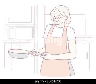 Une femme âgée se livrant à l'activité délicieuse de cuisiner dans sa cuisine à l'aide d'une poêle à frire Banque D'Images