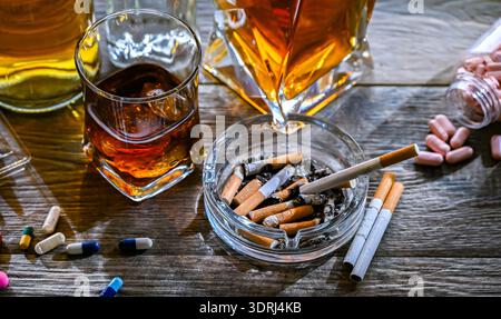 Les substances addictives, y compris l'alcool, les cigarettes et les drogues Banque D'Images