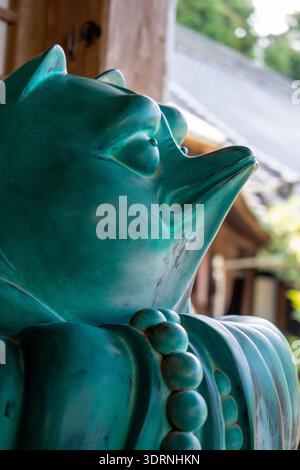 Statue de Tanuki au temple Daisho-in, île de Miyajima, Japon Banque D'Images