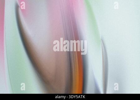 Un fond flou abstrait montrant des nuances de vert orange rose et blanc dans une texture douce et rêveuse Banque D'Images