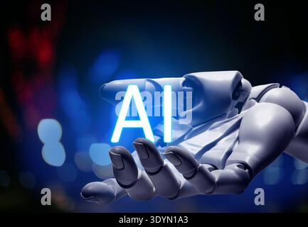 Main de robot tenant le signe ai virtuel sur fond flou. Concept d'intelligence artificielle Banque D'Images