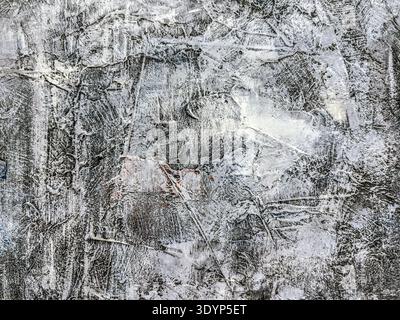 peinture à l'huile impasto abstraite texturée. coups de pinceau blancs épais sur fond de toile sombre. Banque D'Images