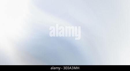 Une image abstraite avec des tons doux et mélangés de bleu clair et de blanc, ressemblant à une aquarelle délicate ou à un ciel nuageux. La texture est subtile Banque D'Images