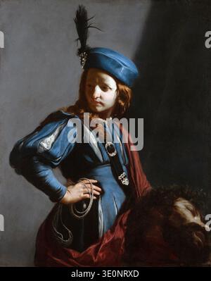 Cette peinture à l'huile baroque du XVIIe siècle, « David à la tête de Goliath », de l'artiste italien Guido Cagnacci, représente un jeune David dans une tunique bleue et un béret à plumes, tenant une fronde et debout au-dessus de la tête coupée de Goliath. Le chiaroscuro signature de Cagnacci et son réalisme intense sont évidents dans cette scène puissante, probablement créée entre 1645 et 1650. Banque D'Images