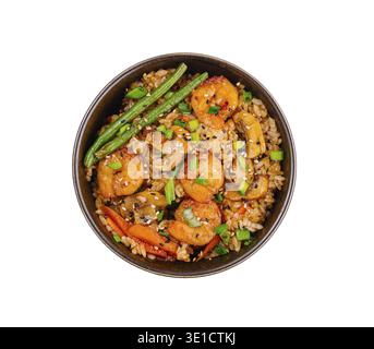 Vue de dessus d'un délicieux sauté de crevettes avec des légumes et du riz dans un bol sombre Banque D'Images