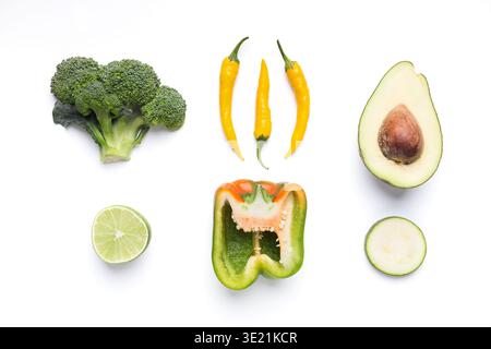 Composition créative de légumes verts et jaunes Banque D'Images