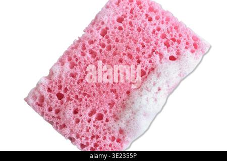 Éponge de cellulose rose, utilisée pour laver la vaisselle à la main. Banque D'Images