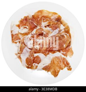 Jambon tranché Prosciutto di Parma sur plaque isolé sur fond blanc Banque D'Images