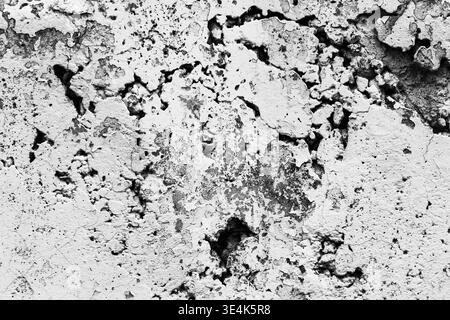 Vieille texture de mur en béton blanchi altéré. Surface vieillie en ciment peint gris Shabby. Fond grunge abstrait Banque D'Images