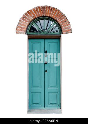 Porte à deux vantaux en bois turquoise avec tableau arrière semi-circulaire avec grille radiale et linteau arqué rond en brique apparente. Informatique traditionnelle Banque D'Images