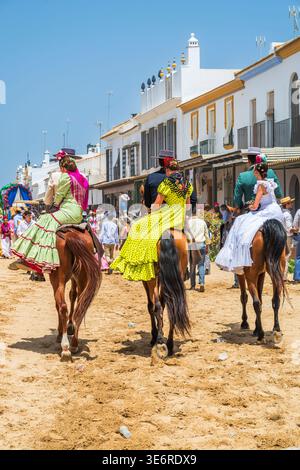 Pèlerins à cheval à Romeria de El Rocio pèlerinage, El Rocio, Huelva, Andalousie, Espagne Banque D'Images