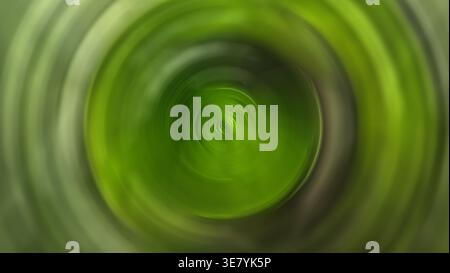 Spirale verte abstraite tourbillonnant dans un effet de flou de mouvement Banque D'Images