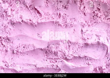 Texture de crème glacée bleuet. Glace rose de baies détaillée ou sorbet comme arrière-plan. Banque D'Images