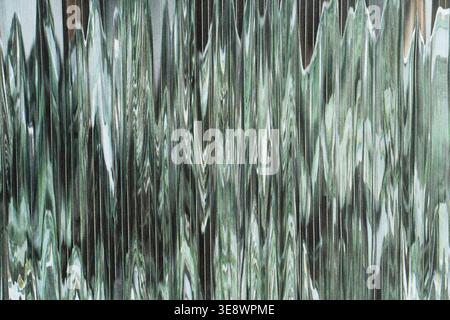 Motif abstrait vert et gris à paillettes avec texture liquide ondulée Banque D'Images