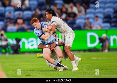 Sydney, Australie. 17 avril 2026. SID Harvey des Waratahs est attaqué lors du match de Super Rugby Pacific Rd 10 2026 entre les Waratahs et Moana Pasifika à l'Allianz Stadium le 17 avril 2023 à Sydney, Australie crédit : IOIO IMAGES/Alamy Live News Banque D'Images