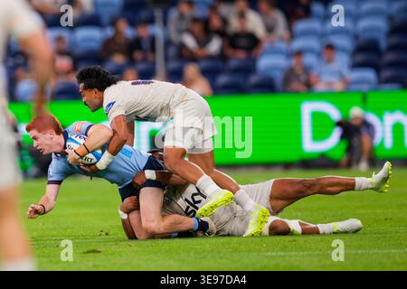 Sydney, Australie. 17 avril 2026. SID Harvey des Waratahs est attaqué lors du match de Super Rugby Pacific Rd 10 2026 entre les Waratahs et Moana Pasifika à l'Allianz Stadium le 17 avril 2023 à Sydney, Australie crédit : IOIO IMAGES/Alamy Live News Banque D'Images
