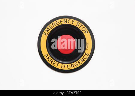 Bouton d'arrêt d'urgence sur un mur Banque D'Images