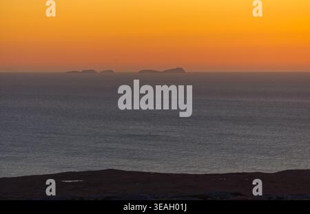 Coucher de soleil sur les îles Flannan Banque D'Images