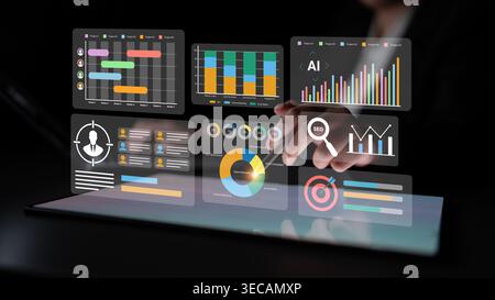 Un professionnel s'engage avec un tableau de bord d'analyse numérique présentant des graphiques et des diagrammes dynamiques, mettant en évidence les informations sur les données et les performances Banque D'Images