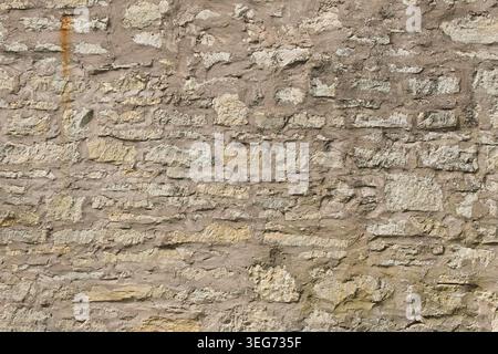 Mur de pierre rustique construit en utilisant une technique connue sous le nom de maçonnerie de gravats, Saaremaa, Estonie, Europe. Banque D'Images