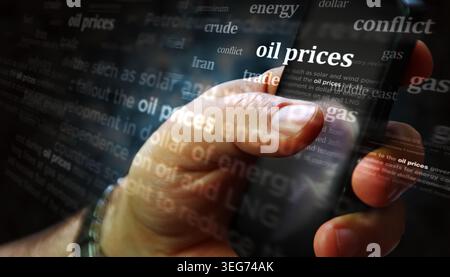 Les prix du pétrole et du carburant sur les médias sociaux exposés. Recherche sur tablette, pad, téléphone ou écran de smartphone dans la main. Concept abstrait des titres de nouvelles 3d il Banque D'Images