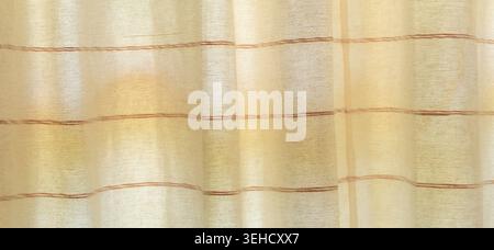La texture de fond de rideau ou de drapé marron avec motif d'onde est utilisée comme texture de fond dans le travail d'art décoratif. Banque D'Images