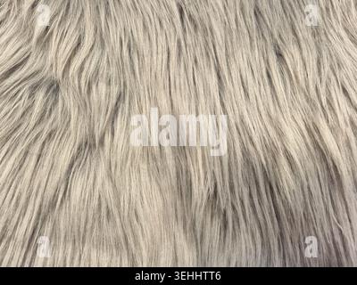 Une vue détaillée et plein format d'un textile pelucheux et déchiqueté avec de longues fibres, parfait pour les arrière-plans ou les éléments de design Banque D'Images