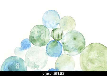 Cercles d'aquarelle abstraite dans les tons bleus et verts sur fond blanc Banque D'Images