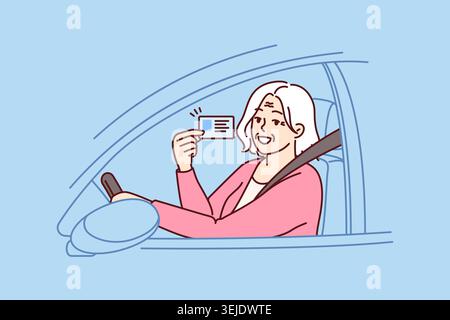 Une femme heureuse et âgée démontre un permis de conduire pour un voyage sur route assis derrière une roue de voiture Banque D'Images