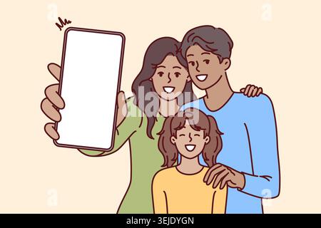 La famille heureuse tient le téléphone avec l'écran blanc dans les mains, offrant d'utiliser l'application mobile de publicité Banque D'Images