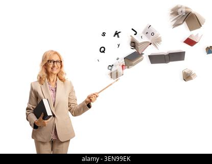 Professeur féminin pointant vers des livres volants isolés sur fond blanc Banque D'Images