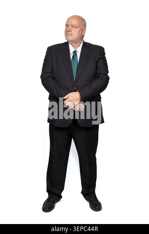 Portrait d'homme d'affaires pleine longueur regardant à droite isolé sur fond blanc Banque D'Images