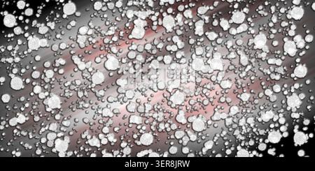 Un fond artistique abstrait avec de nombreuses formes blanches, texturées et circulaires dispersées sur un dégradé diagonal sombre et dramatique de noir et R. Banque D'Images