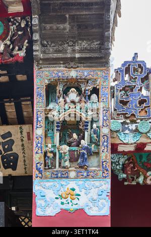 Temple de Kun Iam Tong, Macao. Des figures en céramique décorent le temple le temple a été fondé au 13ème siècle mais les bâtiments actuels datent de 1627. I Banque D'Images