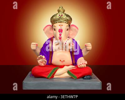 Dieu hindou Ganesha sur fond coloré photo stock Banque D'Images