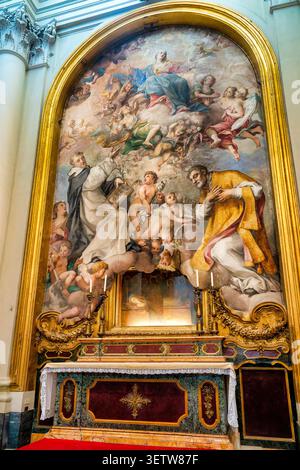 Retable de l'Assomption avec les saints Dominic et Philip Neri, par Odazzi et Stern. Rome, Italie. Banque D'Images