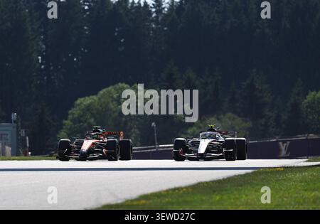 June 26, 2026, Red Bull Ring, Spielberg, Formula 1 Austrian Grand Prix 2026, in the picture Lando Norris (GBR), McLaren Mastercard F1 Team, Oliver Bearman (GBR), TGR Haas F1 Team Banque D'Images