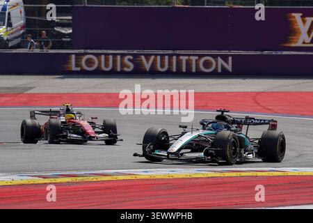 Spielberg, Austria. 28th June, 2026. George Russell 63 (GBR) Mercedes and Lewis Hamilton 44 (GBR) Ferrari during the Formula 1 Lenovo Austrian Grand Prix 2026, 8th round of the 2026 Formula 1 World Championship from 26th-28th June, 2026 at the Red Bull Ring, Spielberg, Austria. Credit: Robbie Hoad/Every Second Media Credit: Every Second Media/Alamy Live News Banque D'Images