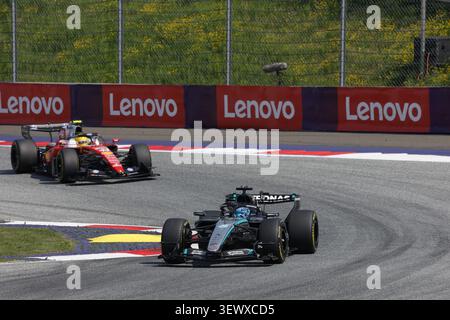IPA86197690 - 63 RUSSELL George (gbr), Mercedes AMG F1 Team W17, action 44 HAMILTON Lewis (gbr), Scuderia Ferrari SF-26, action during the Formula 1 Austrian Grand Prix 2026, 8th round of the 2026 Formula One World Championship from June 26 to 28, 2026 on the Red Bull Ring, in Spielberg, Austria Banque D'Images