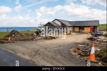 Une nouvelle maison individuelle en construction sur l'île de Whalsay, îles Shetland, Écosse. Banque D'Images