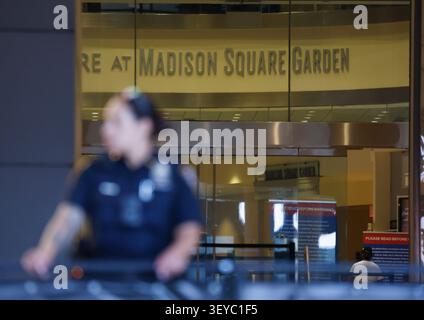 New York, United States. 02nd July, 2026. NYPD police officers stand at an entrance to Madison Square Garden one day before the Taylor Swift and Travis Kelce wedding on Thursday, July 2, 2026 in New York City. Permits were filed to close portions of West 31st Street and West 33rd Street for the duration of events and the surrounding streets around MSG will be closed to both vehicles and pedestrians. Photo by John Angelillo/UPI Credit: UPI/Alamy Live News Banque D'Images