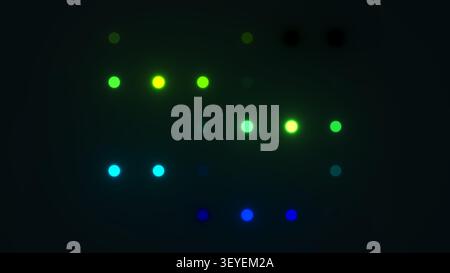 Des points lumineux apparaissent en vert, bleu et jaune sur un fond sombre créant un affichage vibrant et coloré. L'agencement forme un motif aléatoire Tha Banque D'Images