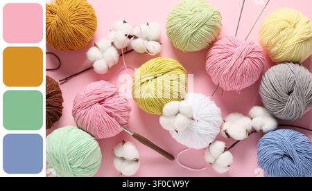 Boules de fil colorées et branches de coton sur fond rose Banque D'Images