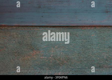 Texture de fond horizontale de vieilles planches en bois peintes en bleu présentant des veines naturelles, une surface de bois usée et des détails vintage rustiques. Banque D'Images