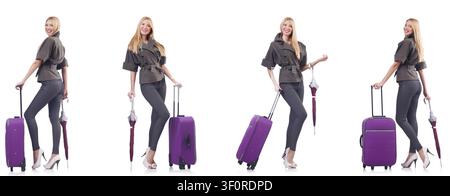 Belle jeune femme avec valise et parapluie isolated on white Banque D'Images