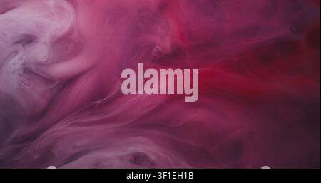 Vague de brume. Brouillard artistique. Nuage violet rouge mélange de liquide coloré enroulé. Encre floue abstraite déversement fluide fuite de pigment fondue fond d'emulsion. Banque D'Images