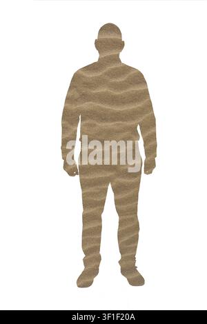 Silhouette d'un homme debout faite avec du sable Banque D'Images